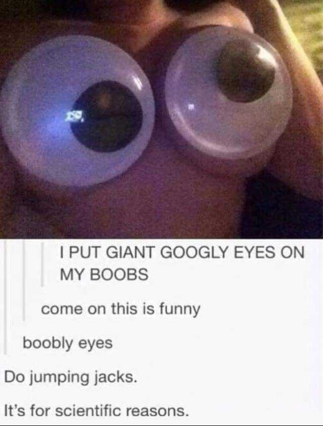 someone is holding a pair of fake eyes with a caption