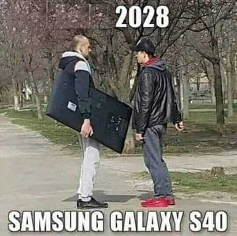 they are standing on a sidewalk with a suitcase and a sign that says samsung galaxy s40