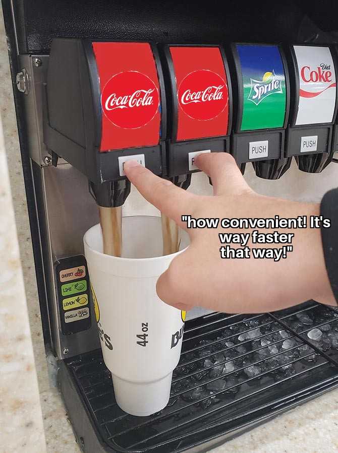 someone is holding a cup of coffee in front of a vending machine