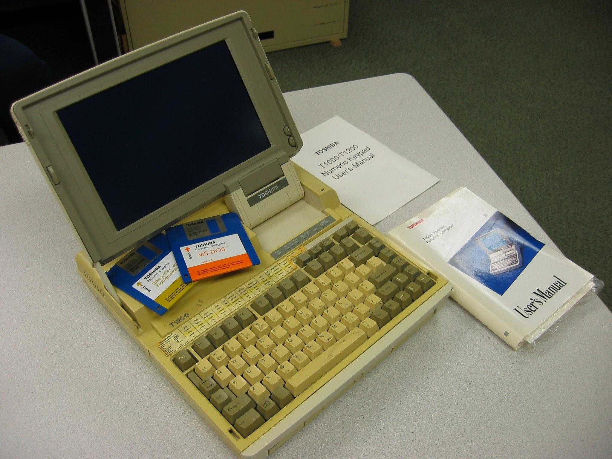 there is a computer with a keyboard and a monitor on a table