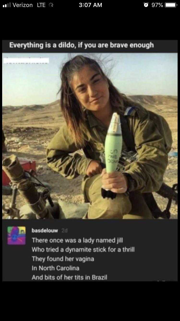 a woman in a military uniform holding a bottle of water