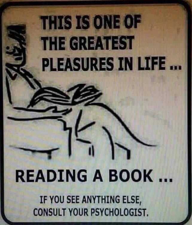 there is a sign that says reading a book is one of the greatest pleasures in life