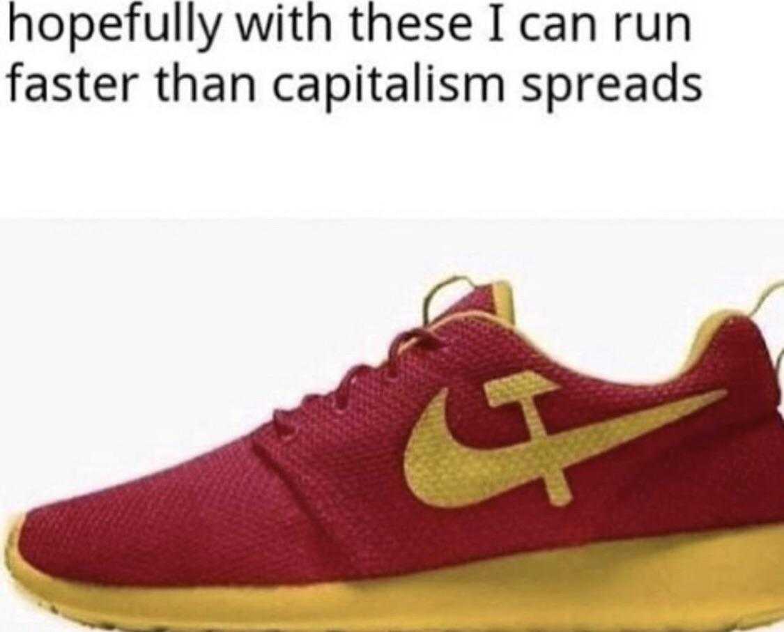 a close up of a red and gold shoe with a caption of a caption