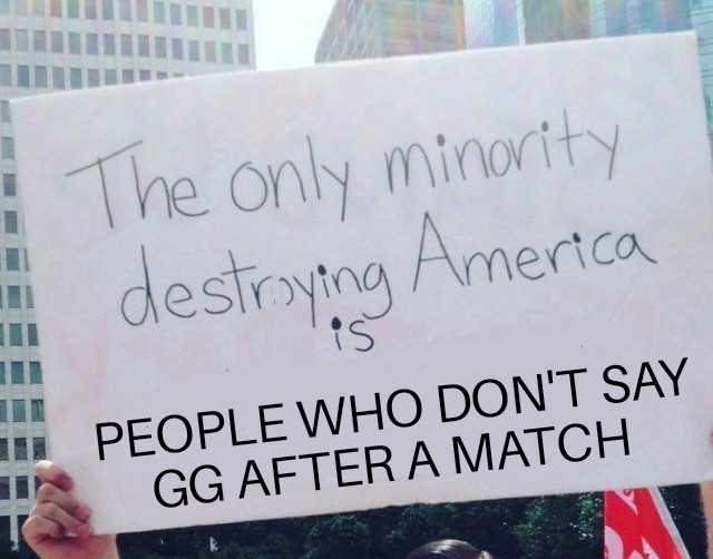 someone holding a sign that says the only minority destroying america is people who don ' t say gaffer match