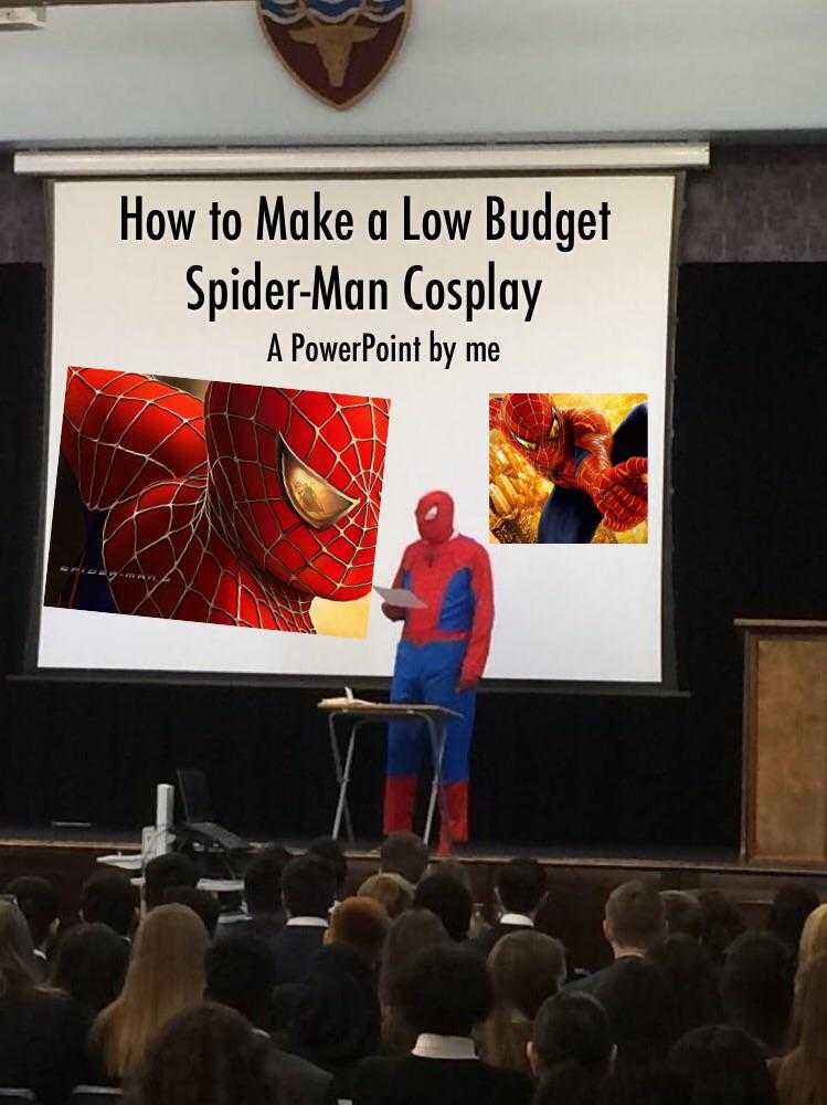 there is a man in a spider - man costume standing on a stage