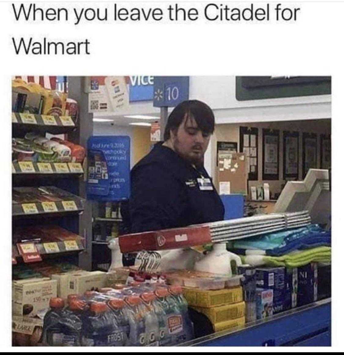 man in a store with a cash register