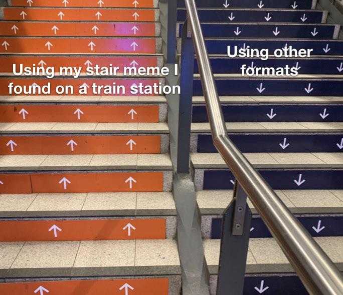 stairs with arrows painted on them and a sign that says using stair meme found on a train station