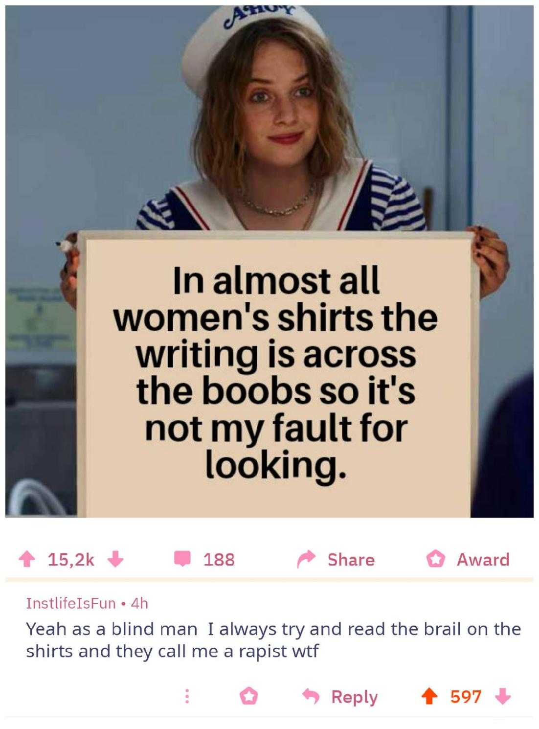 a woman holding a sign that says in almost all women ' s shirts the writing is across the hob