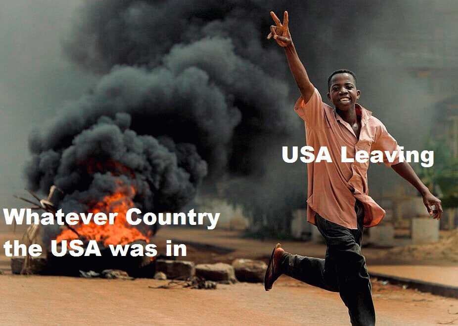 man running in front of a burning fire with the words usa leaving whatever country the usa was in