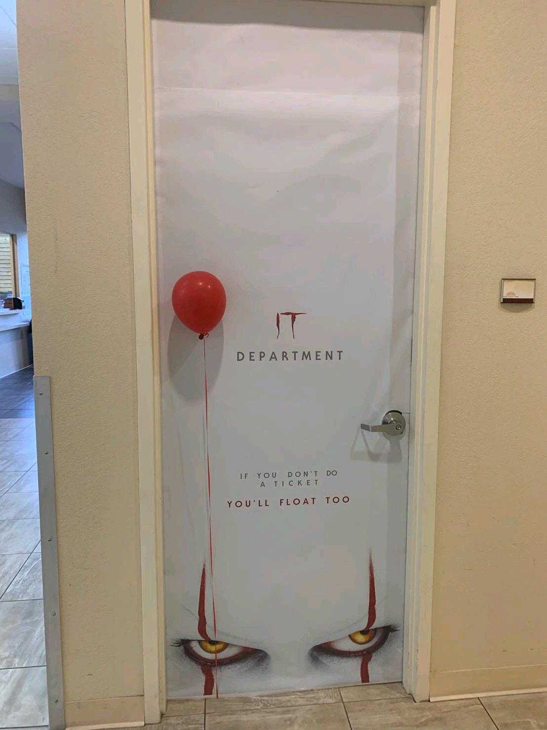 door with a red balloon attached to it