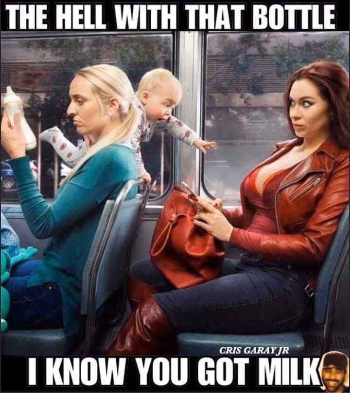 there are two women sitting on a bus with a baby