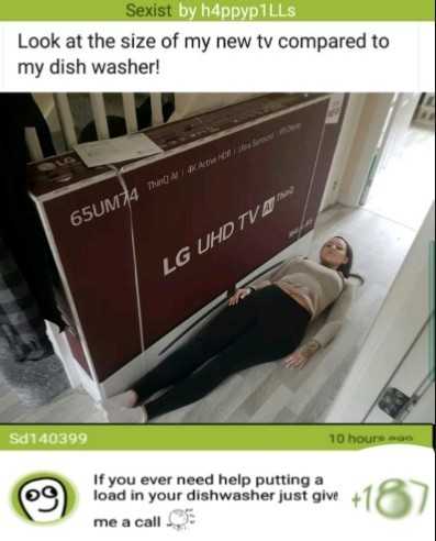 woman laying on a bed with a large sign in the background