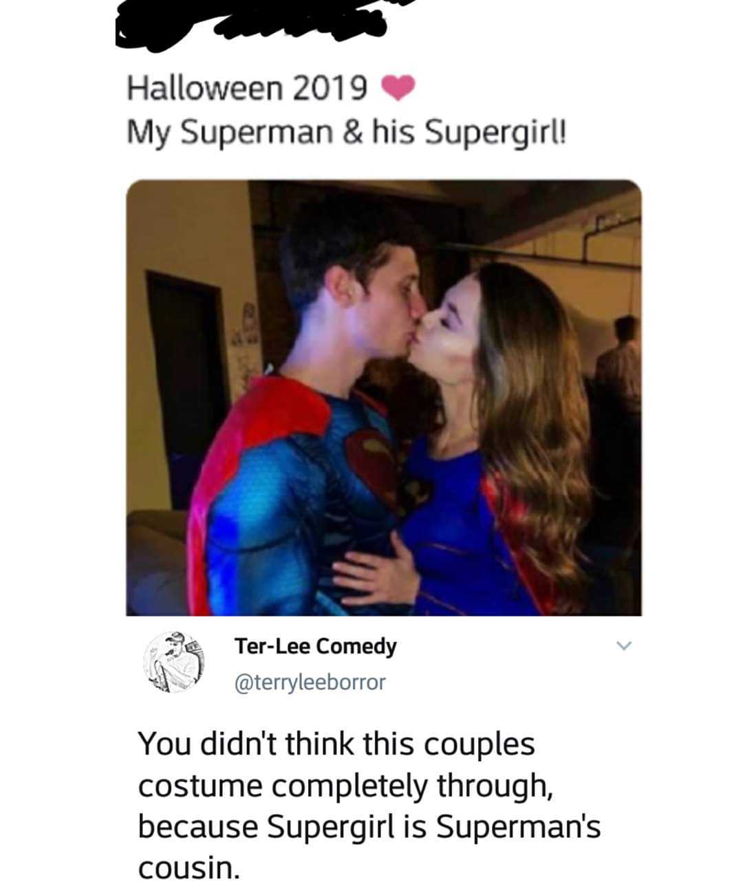 a woman kissing a man in a superman costume