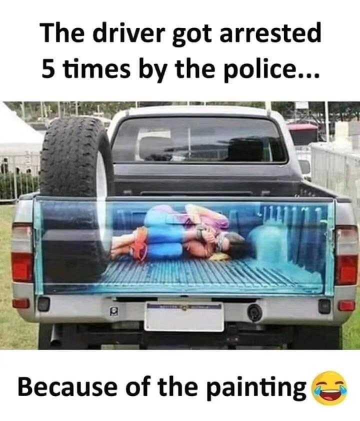 truck with a picture of a man in a pool in the back of it