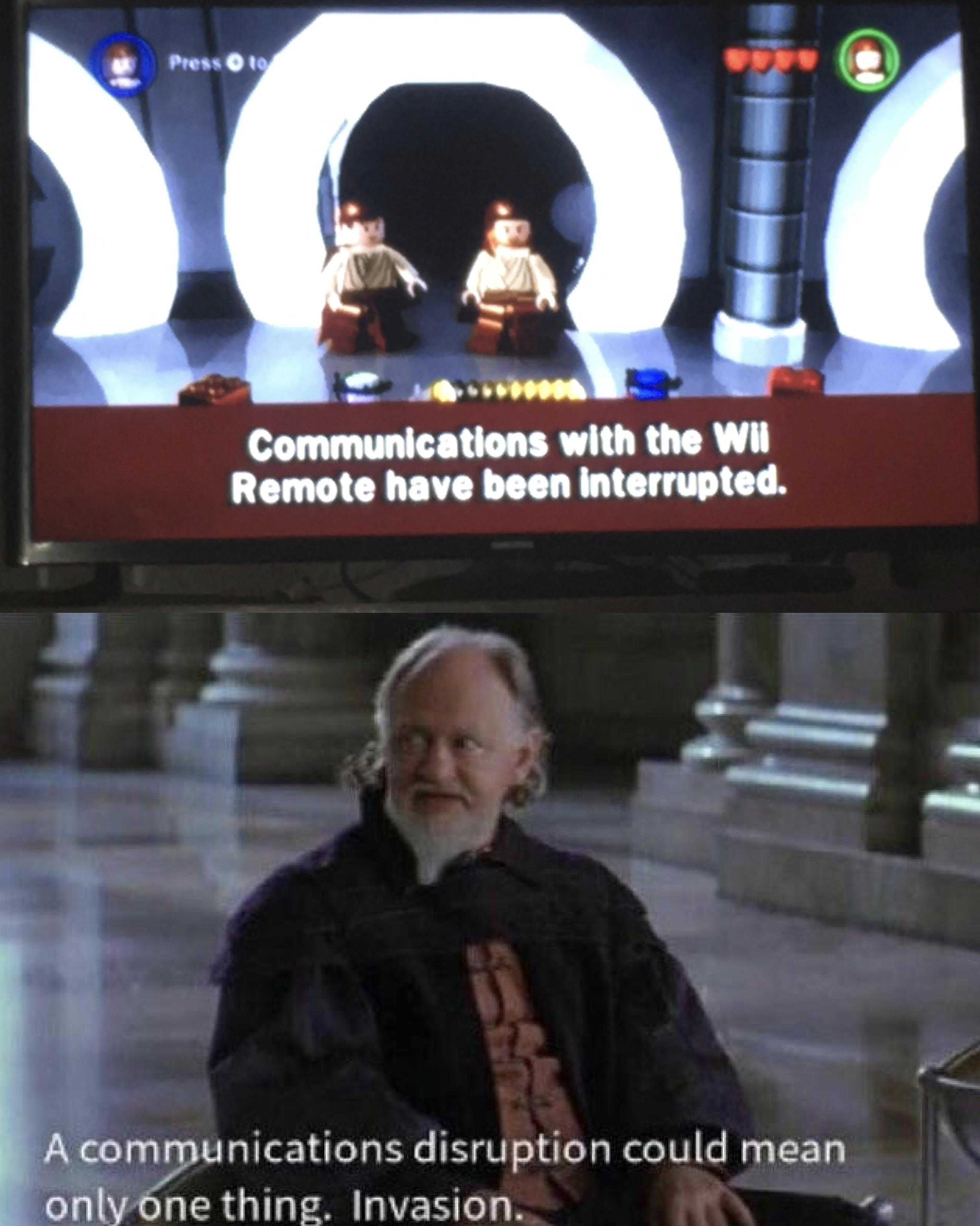 there is a man sitting in a chair in front of a tv