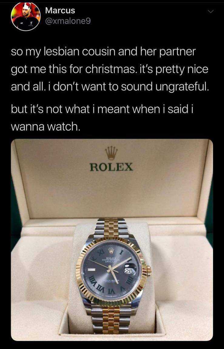 a close up of a watch in a box with a quote