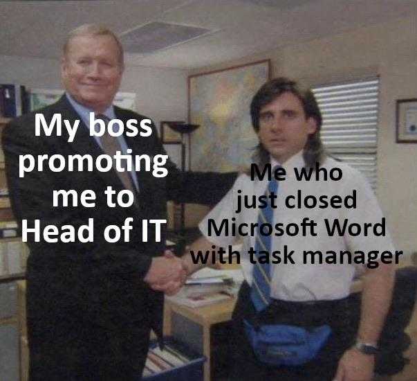 they are two men shaking hands in an office with a desk