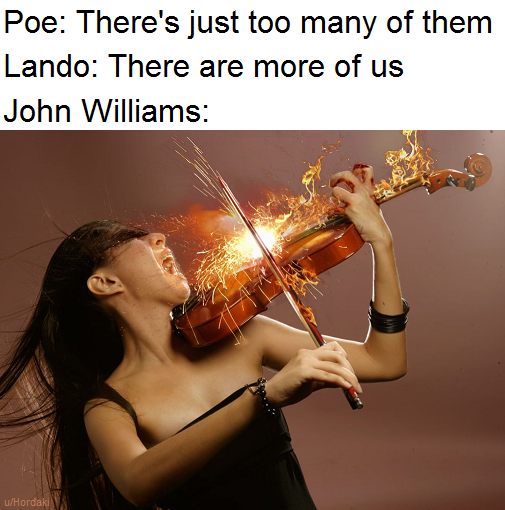 there is a woman that is playing a violin with fire