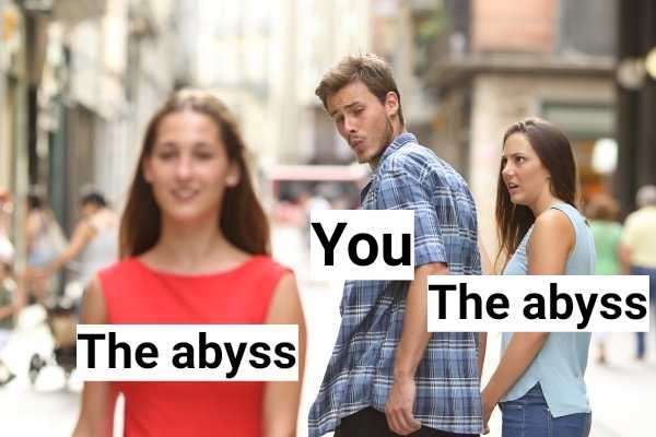 there are two people standing in a street with a sign that says you the abysss