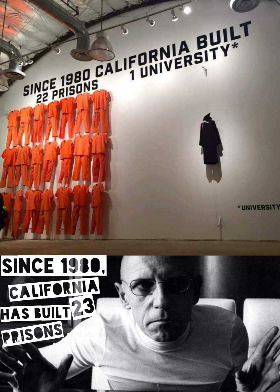 image of a man sitting in a chair in front of a wall with orange prison uniforms