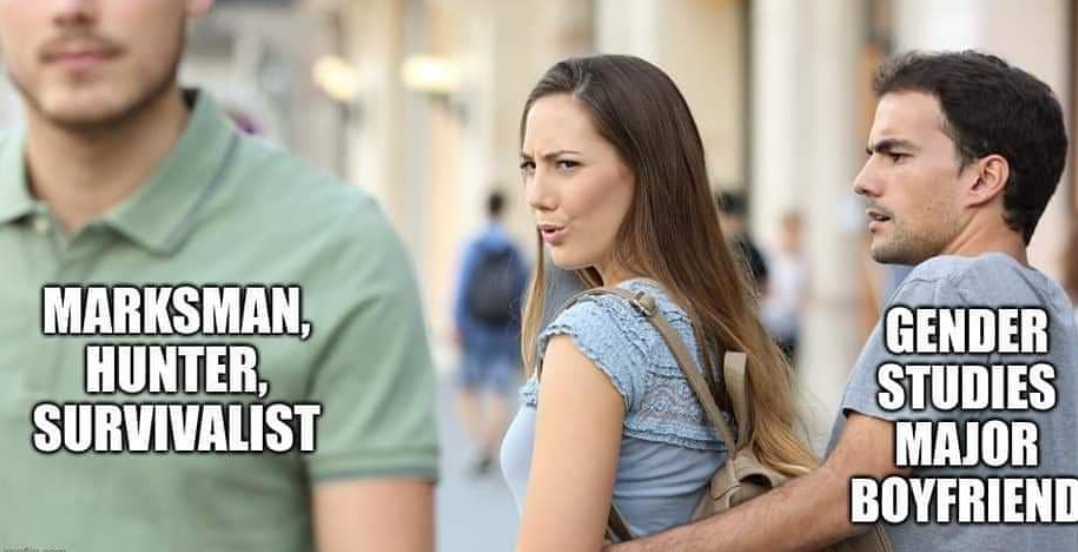 man and woman standing in a street with a man in a green shirt