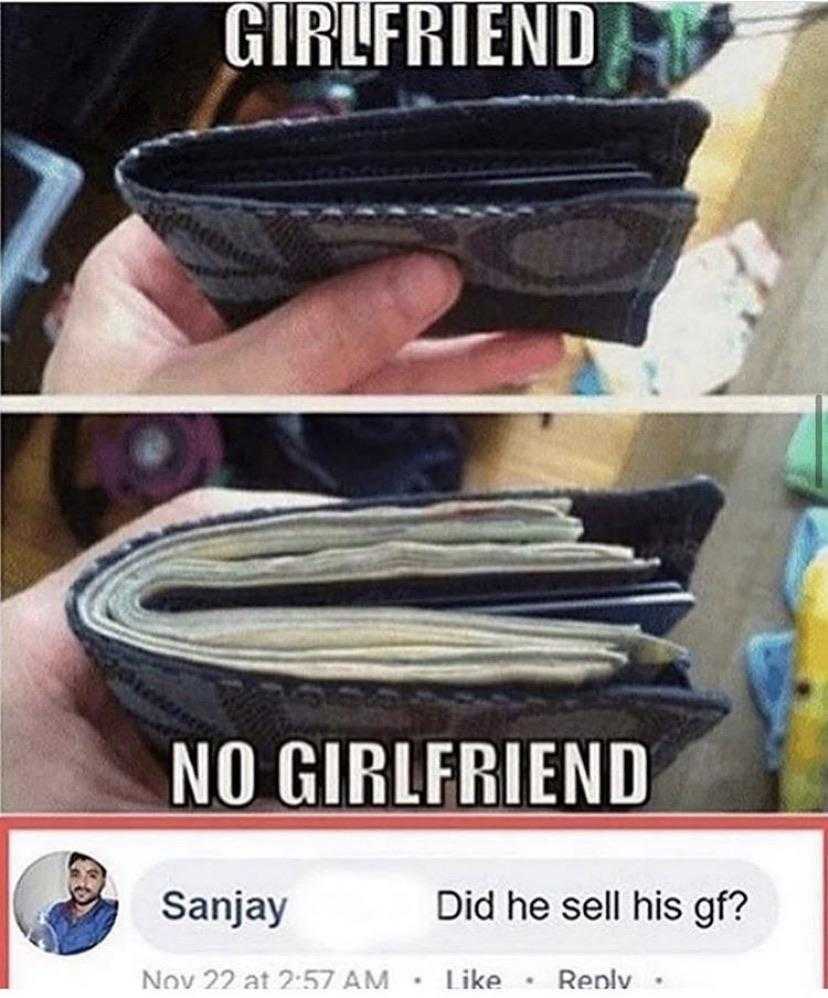 a close up of a person holding a wallet with a caption of a girl friend