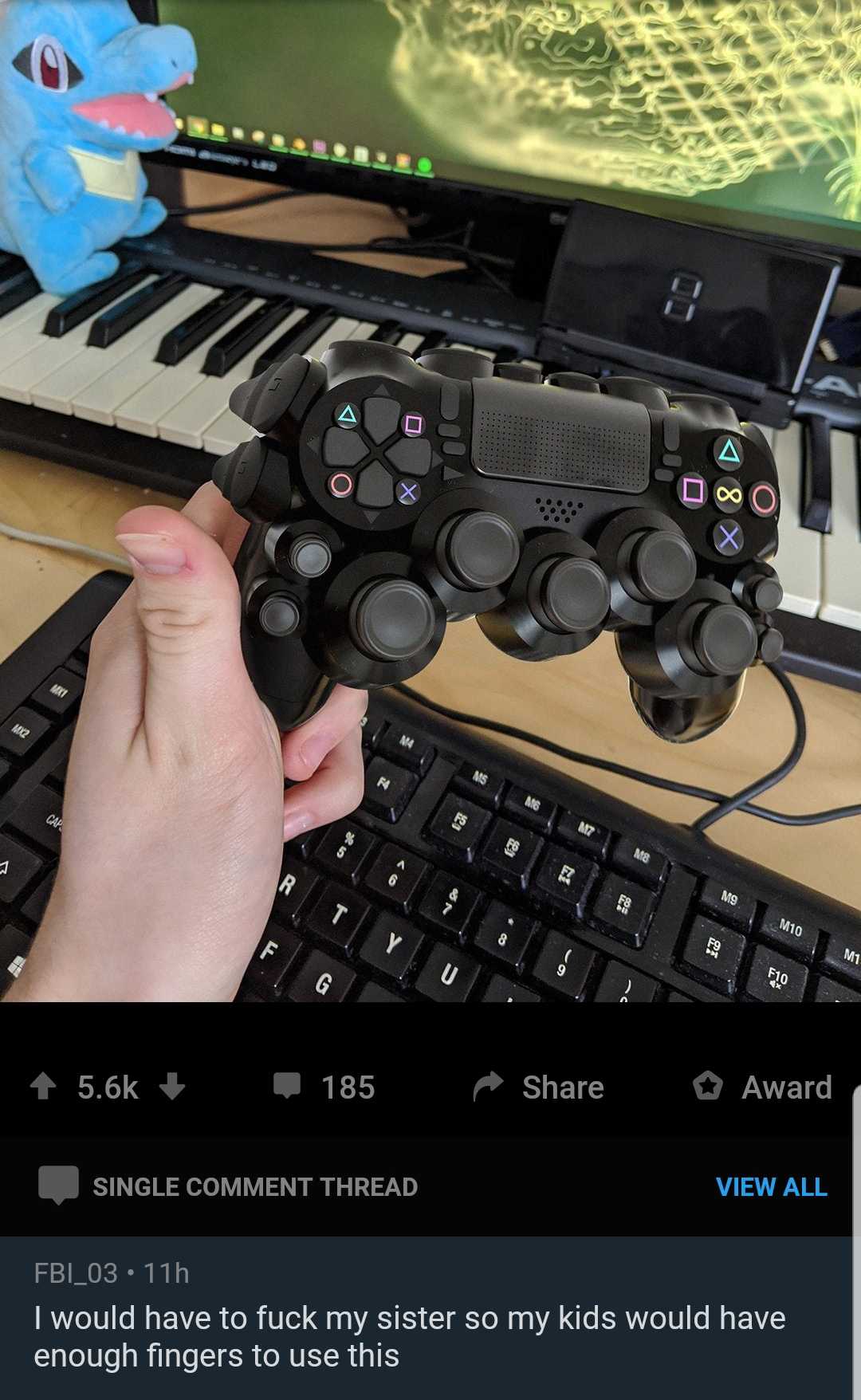 someone is playing a video game with a controller and keyboard