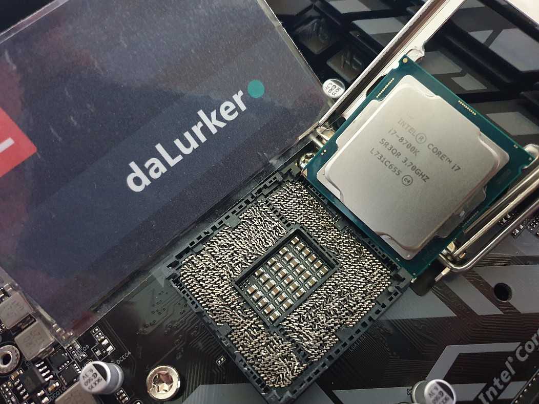 a close up of a computer motherboard with a cpu chip