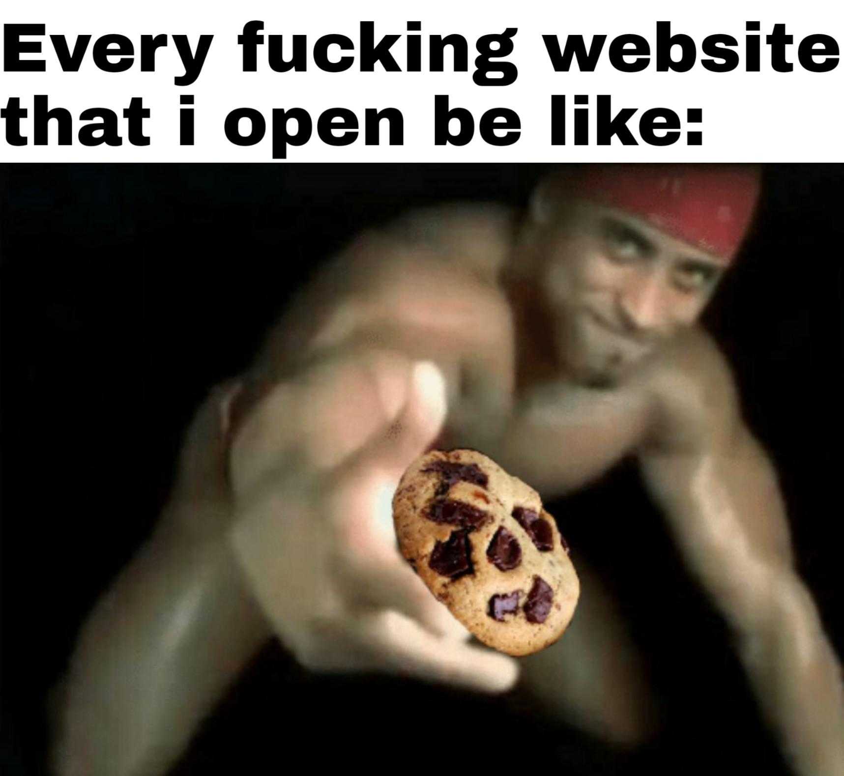 there is a man holding a cookie in his hand