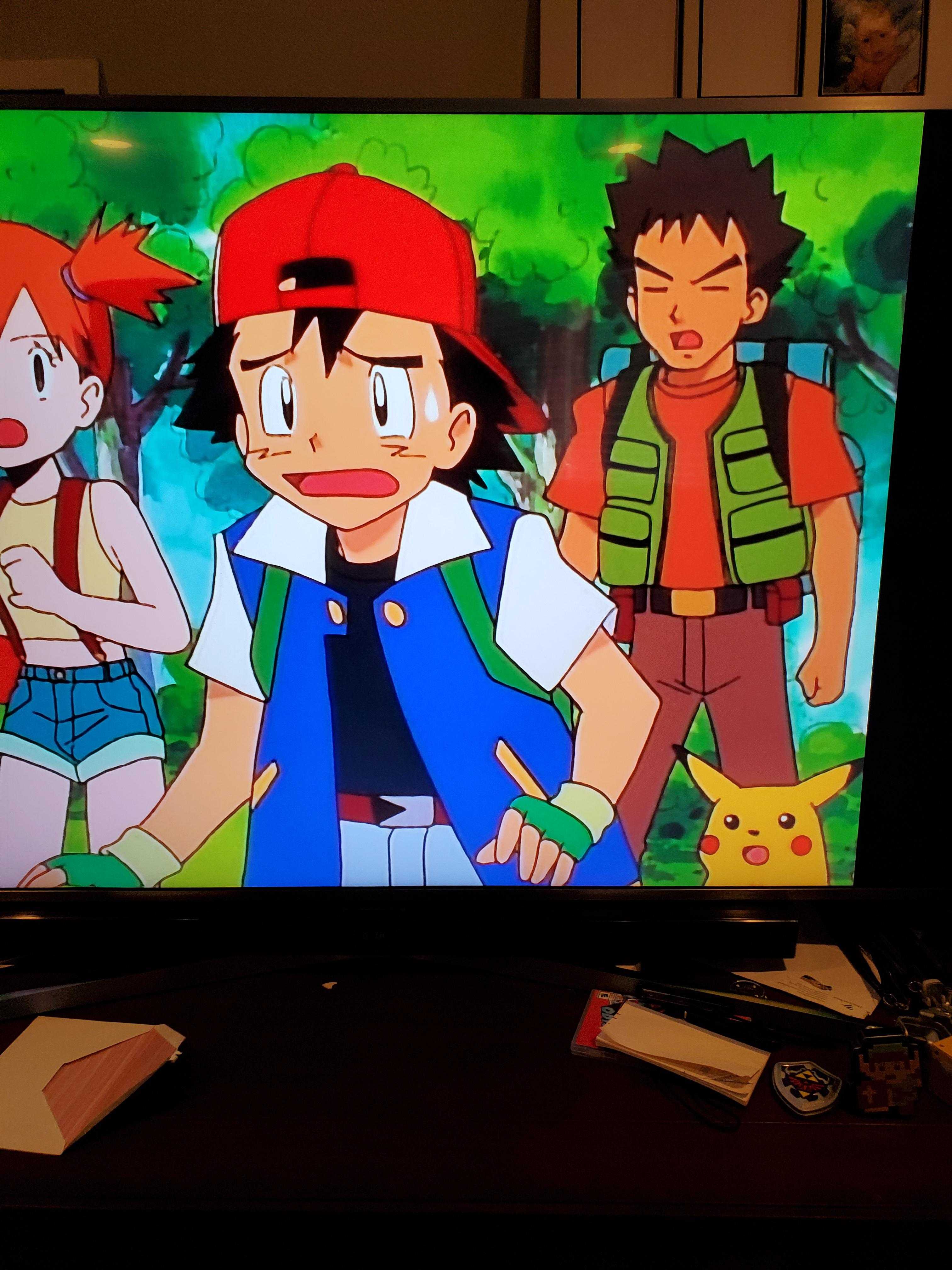 pokemon on a television screen with a pokemon character on it