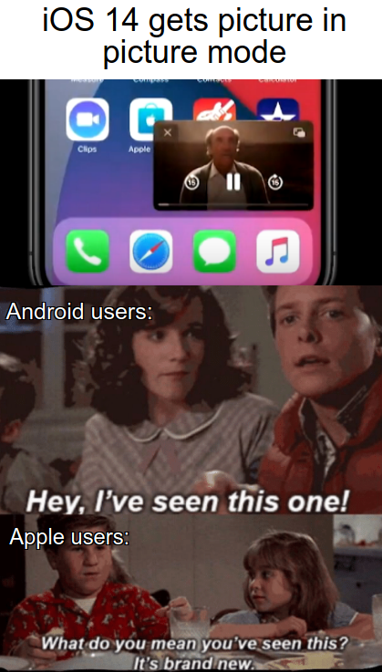 a picture of a cell phone with a picture of a man and a woman on it