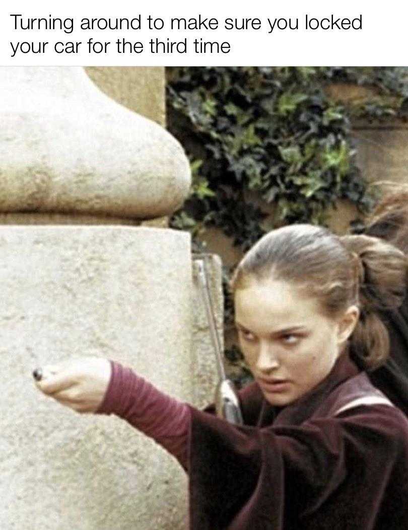 girl pointing at a stone pillar with a knife in her hand