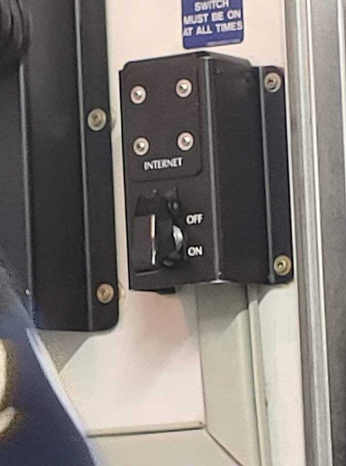 there is a black button on the door of a train