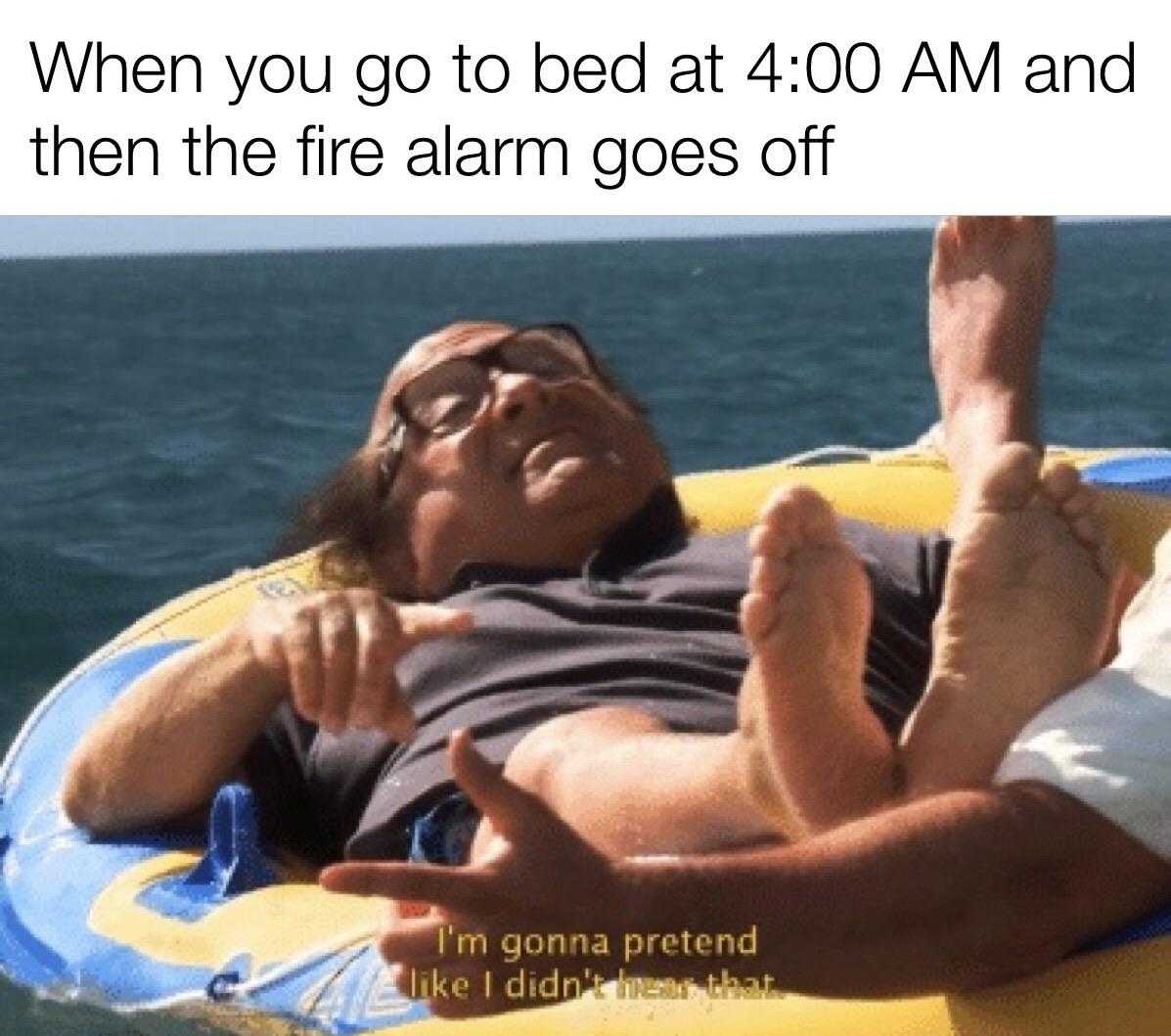 man laying on a raft in the water with a caption saying, when you go to bed at 4 00 am and then fire alarm goes off