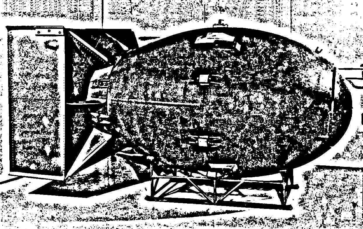 a black and white drawing of a large machine with a large wheel