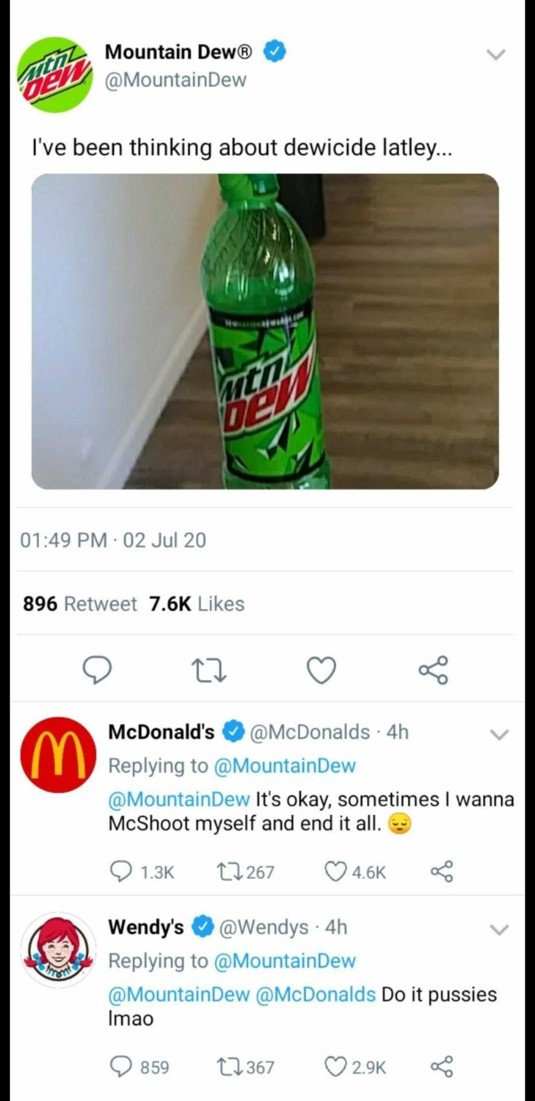 a close up of a bottle of mountain dew on a table