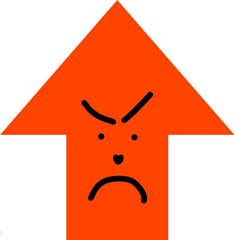 an orange arrow with a sad face drawn on it