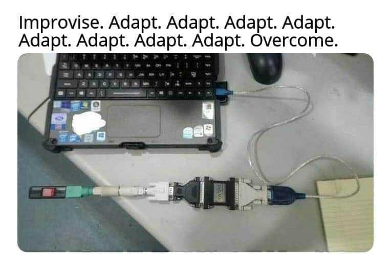 a close up of a laptop computer with a cable connected to it