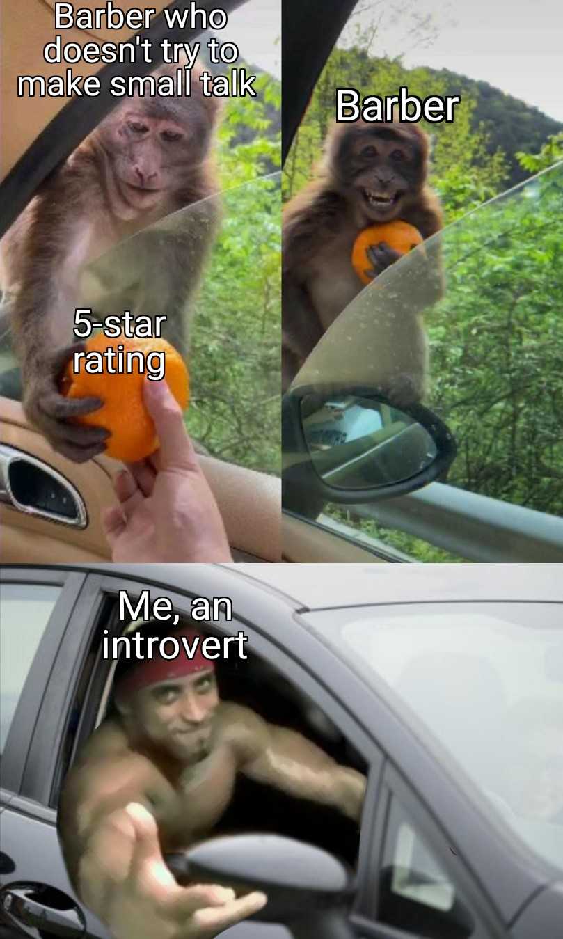 a close up of a person holding an orange in a car