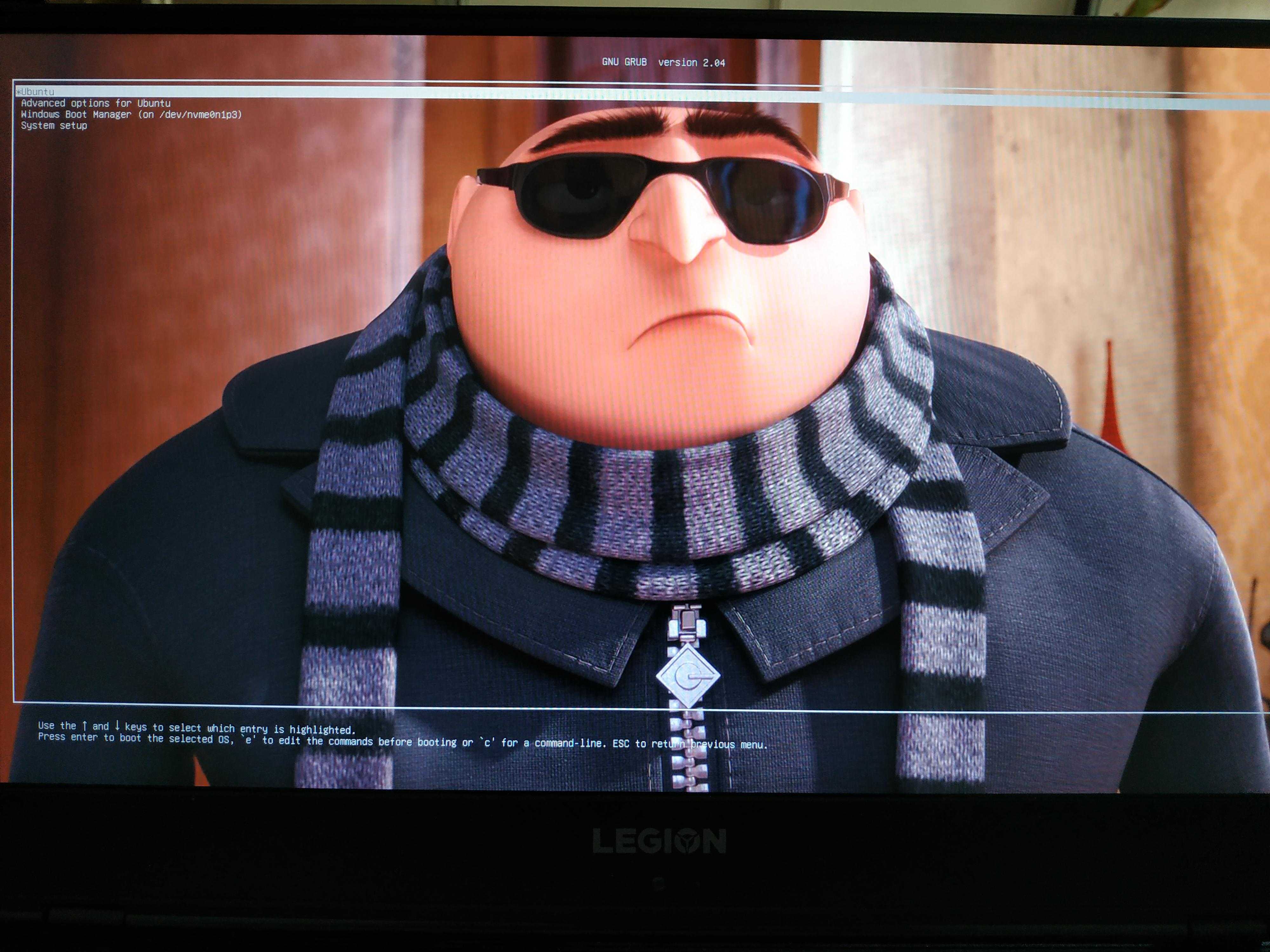 image of a man wearing sunglasses and a scarf on a television screen