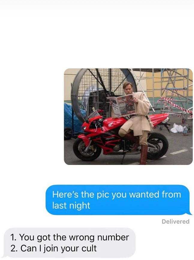 a close up of a text message with a person on a motorcycle