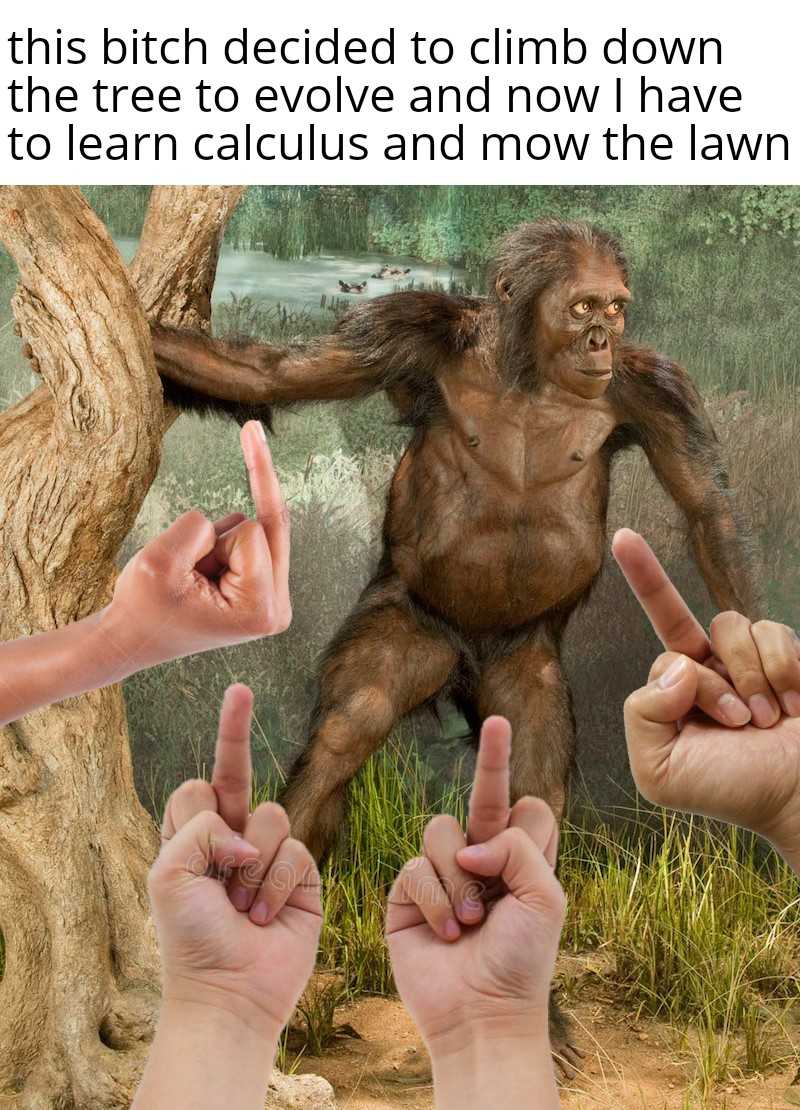 someone is doing a hand sign with their fingers in front of a picture of a gorilla