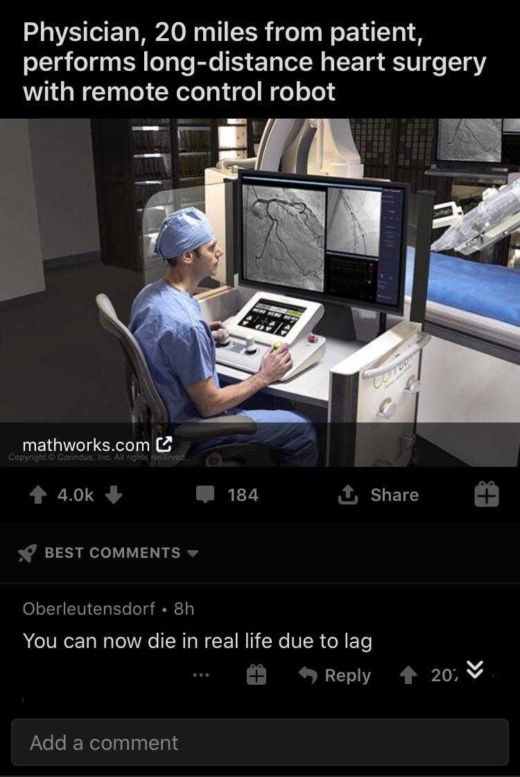 a close up of a person sitting at a desk with a computer