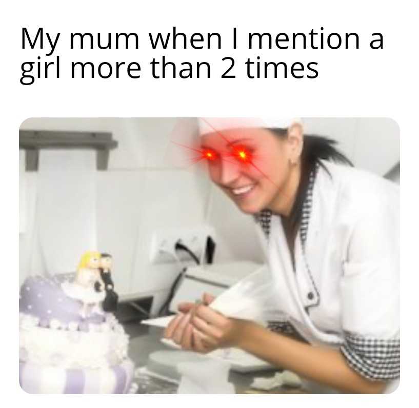 woman in white shirt with red eyes looking at cake with a cat on top