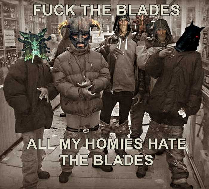 four people in masks stand in a row with a sign that says fuck the blades