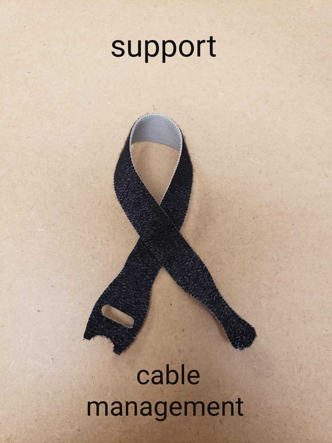 there is a black ribbon with a white ribbon on it