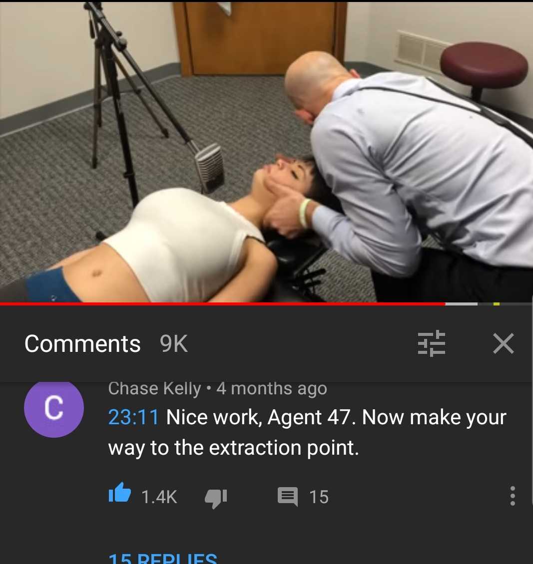 woman being examined by a man in a room