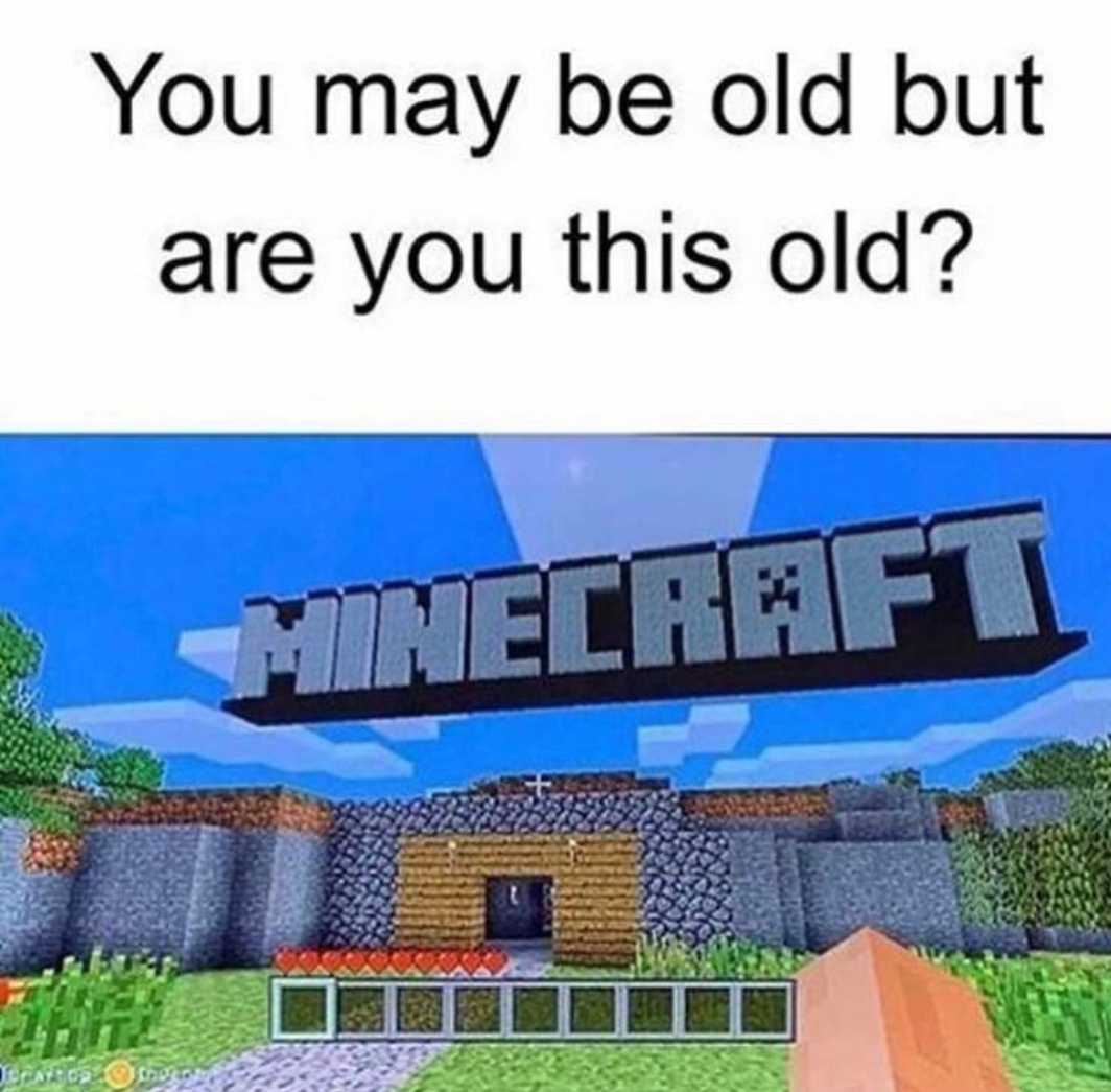 a picture of a minecraft logo with a picture of a building in the background