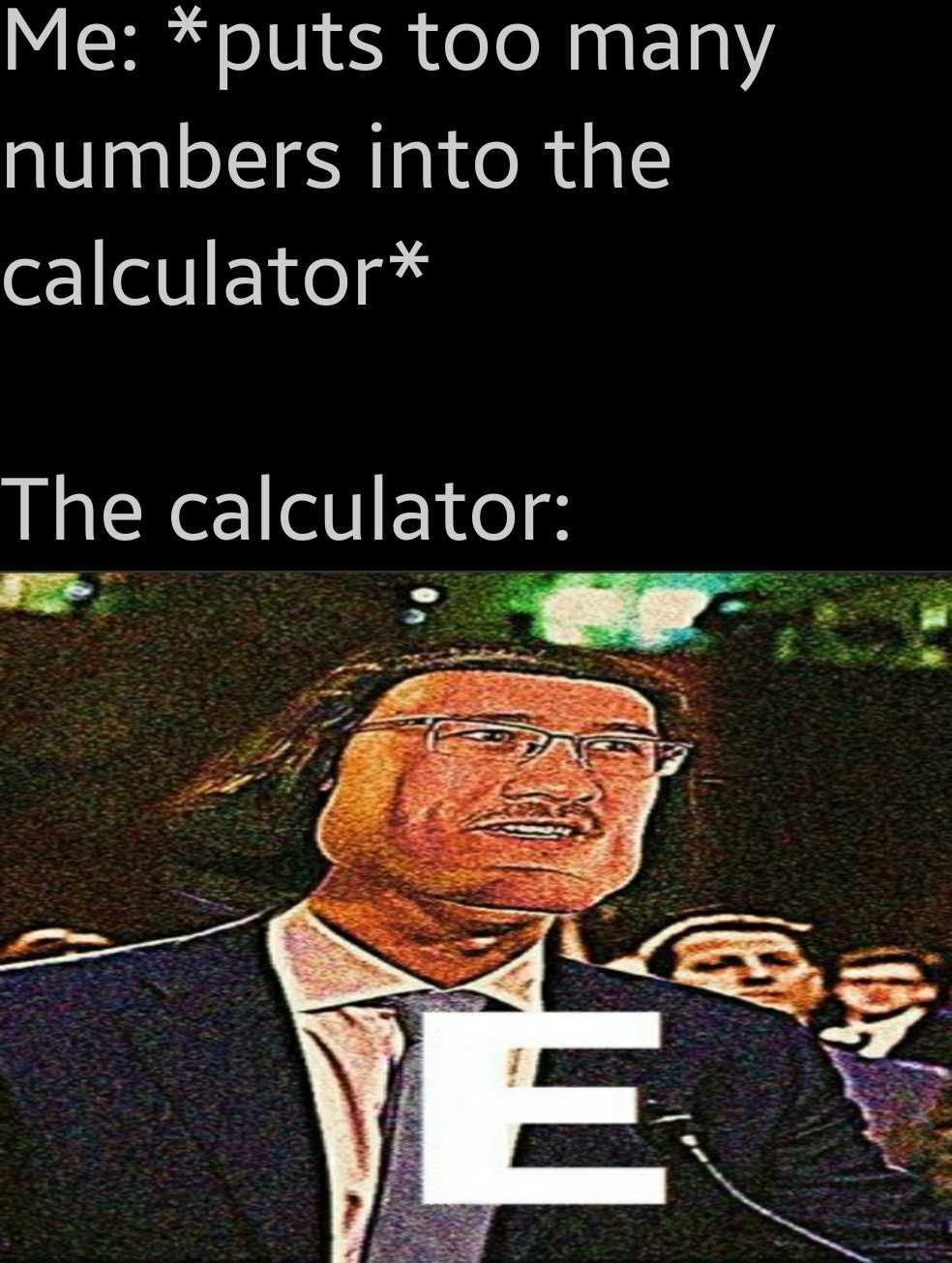 a close up of a person in a suit and tie with a calculator