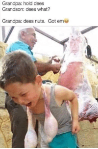 man holding a baby and a large piece of meat